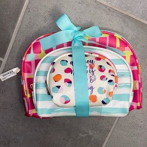 Set of three cosmetic bags.